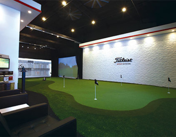 Indoor putting green installation with synthetic golf turf in a Fort Worth training room