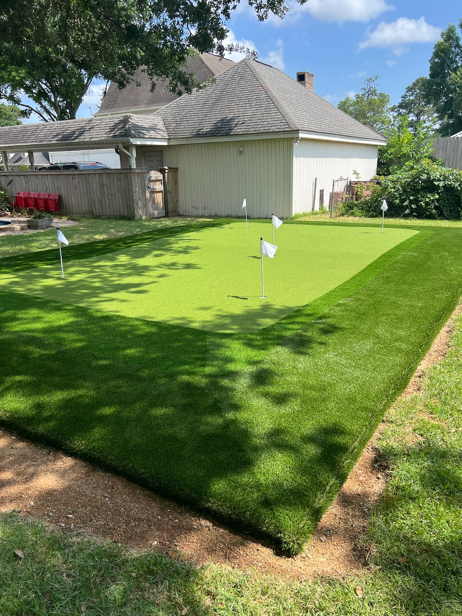 Tour Greens Fort Worth synthetic putting green installation project in Carrollton, Texas