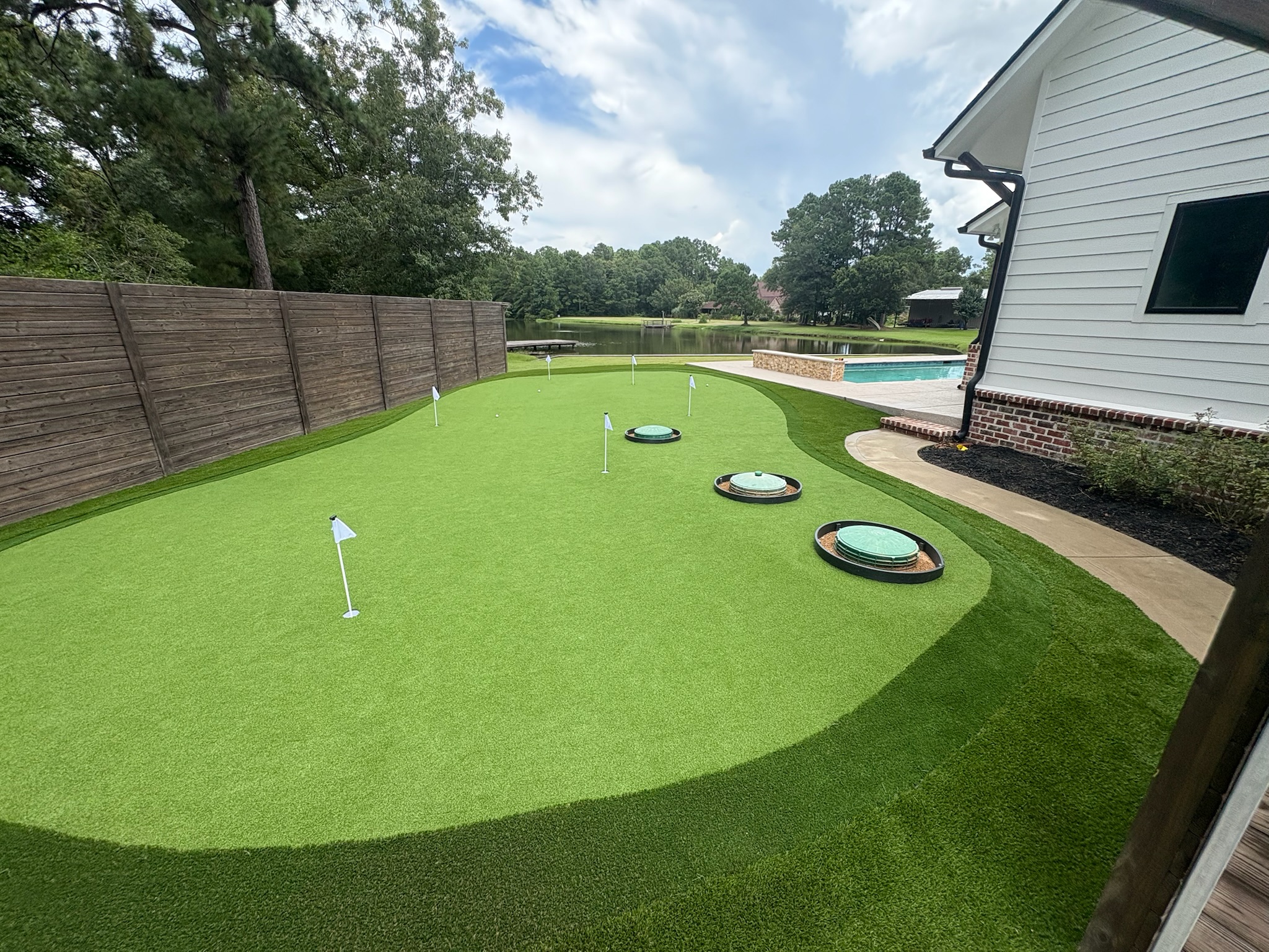 Tour Greens Fort Worth Backyard with Putting Green